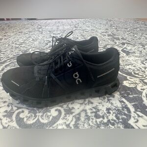 On Running Black Sneakers with CloudTec Cushioning